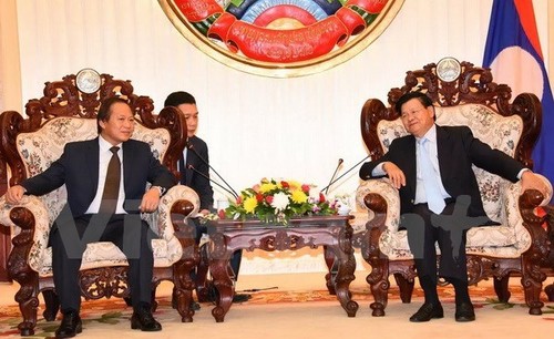 Lao PM suggests Vietnam, Laos cooperating in cyber security  - ảnh 1