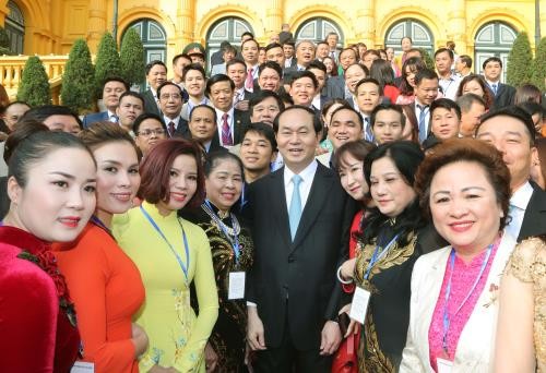 President Tran Dai Quang meets 115 outstanding businesspeople - ảnh 1