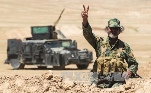 Iraqi forces liberate Hatra from ISIS - ảnh 1