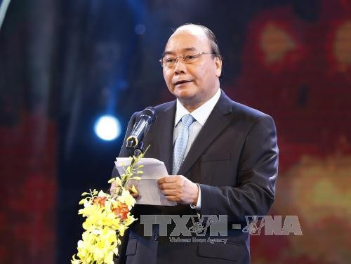 Prime Minister calls for increasing the health insurance coverage to 90 percent by 2020  - ảnh 1