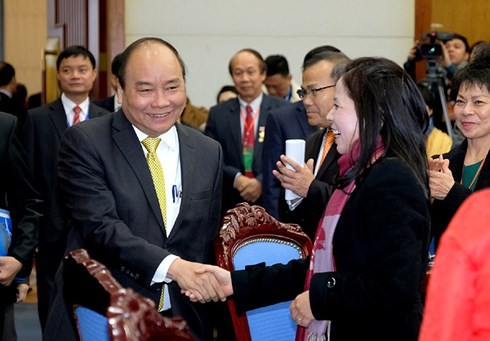 Party, state, government leaders meet overseas Vietnamese on Lunar New Year - ảnh 3