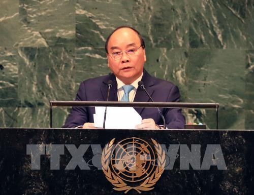 PM calls for joint efforts for world of sustainable development - ảnh 1