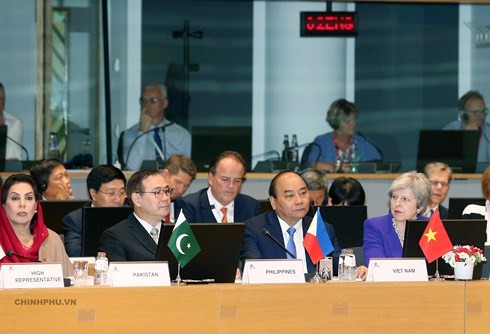 PM concludes participation at ASEM 12, visits to EU, Belgium - ảnh 1