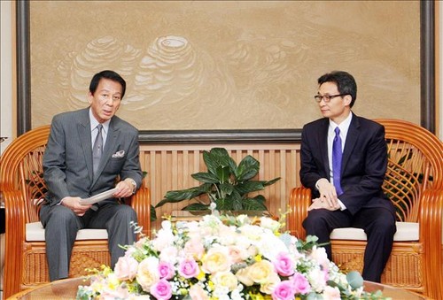 Deputy Prime Minister Vu Duc Dam receives Vietnam – Japan Special Ambassador Sugi Ryotaro   - ảnh 1