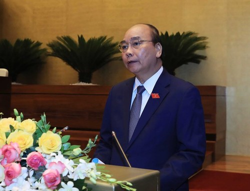 Vietnam determined to contain epidemic, develop economy - ảnh 1