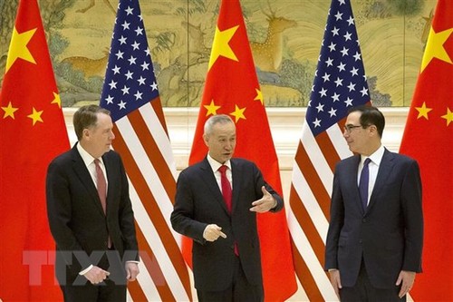 US, China postpone online talks on trade deal - ảnh 1