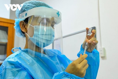 Vietnam's 60% vaccination coverage surpasses WHO target  - ảnh 1