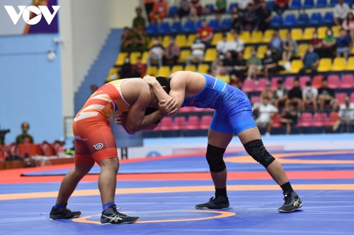 Wrestling team brings home 17 golds at SEA Games 31 - ảnh 11
