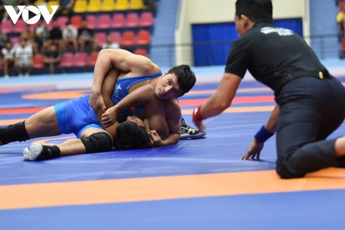 Wrestling team brings home 17 golds at SEA Games 31 - ảnh 12