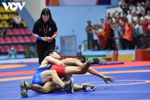 Wrestling team brings home 17 golds at SEA Games 31 - ảnh 4