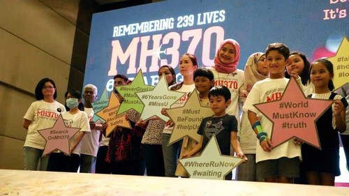 Nine years on, families urge new search for missing Malaysia plane MH370 - ảnh 1