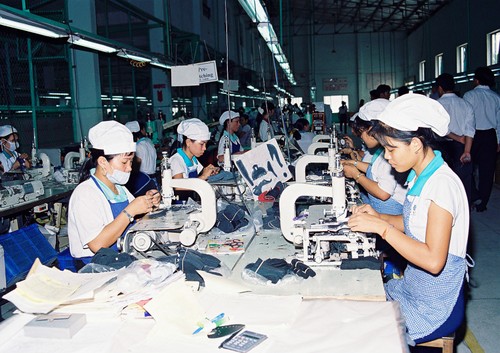 Le textile se fixe l’objectif de 23 milliards de dollars d’exportation en 2014 - ảnh 1
