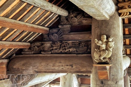 L'art sculptural dans les maisons communales vietnamiennes - ảnh 2