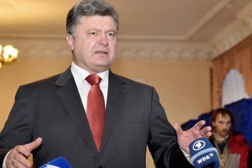 Le président ukrainien appelle à de nouvelles élections dans les régions de l'Est - ảnh 1
