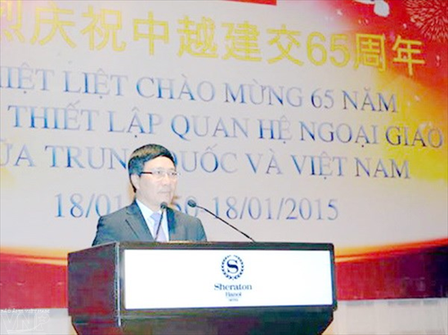 Réception à l’occasion des 65 ans des relations diplomatiques sino-vietnamiennes - ảnh 1