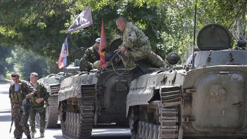 Accord préliminaire en Ukraine sur un autre retrait d'armements - ảnh 1