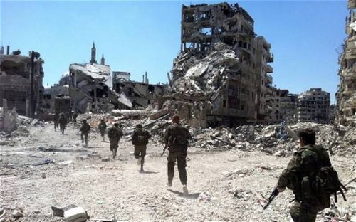 Syrie : les opposants vont remettre une partie de leurs armes lourdes - ảnh 1