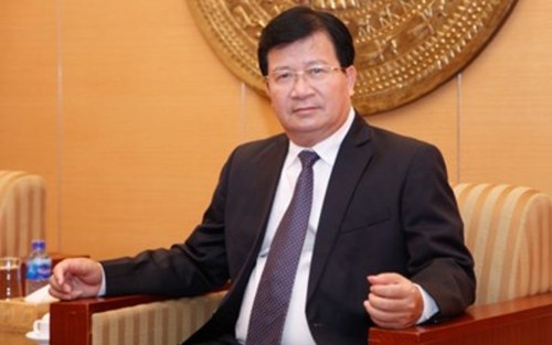 Le vice-Premier ministre Trinh Dinh Dung au Laos - ảnh 1