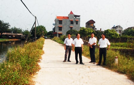 Kecamatan Binh Minh, kabupaten Khoai Chau, provinsi Hung Yen mencapai sasaran lebuh awal dalam pembangunan pedesaan baru - ảnh 2