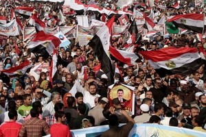 Demonstrasi mendukung Presiden terpecat, Mohamed Morsi di Mesir meledak - ảnh 1
