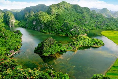 Trang An menyambut  piagam pengakuan UNESCO sebagai Pusaka Budaya dan Alam Dunia - ảnh 1