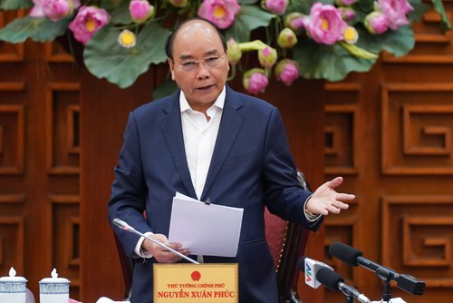 Premier vietnamita expresa su solidaridad con el Gobierno chino por el nuevo coronavirus - ảnh 1