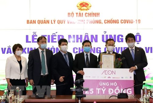 Vietnamitas proporcionan más asistencia para el Fondo Nacional de Vacunas anti-coronavirus - ảnh 1