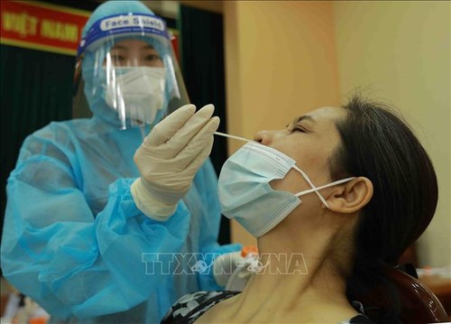 Vietnam confirma  13 321 nuevos contagiados de covid-19 - ảnh 1