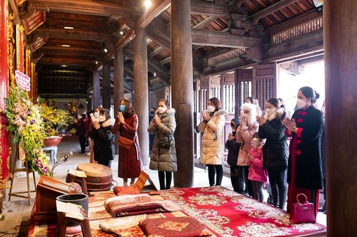 Visitas a las pagodas a principios del Año Nuevo Lunar: belleza cultural de Vietnam - ảnh 5