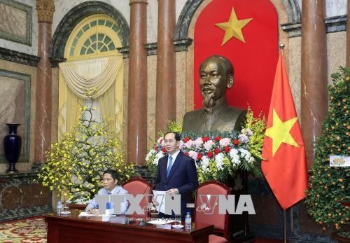 Tran Dai Quang rencontre des conseillers commerciaux vietnamiens à l’étranger  - ảnh 1