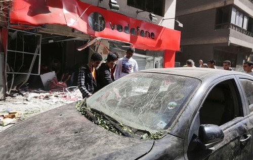Serangan bom di dekat Gedung Mahkamah Agung Mesir, sehingga menimbulkan banyak korban. - ảnh 1