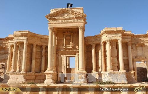 Tentara Suriah melakukan  baku hantam  dengan IS di peluaran kota kuno Palmyra. - ảnh 1