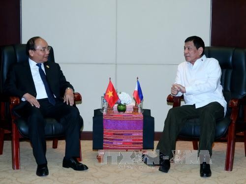 Para pemimpin Vietnam-Filipina menegaskan akan menghargai kerjasama bilateral - ảnh 1