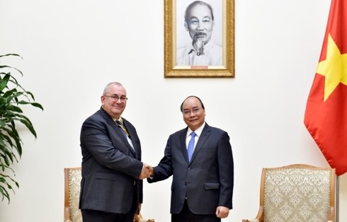 PM Viet Nam, Nguyen Xuan Phuc  menerima Dubes Kerajaan Belgia untuk Viet Nam, Paul Jansen - ảnh 1