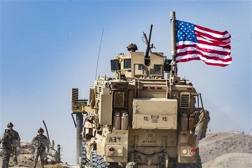 AS  menarik serdadunya ke luar dari dua pangkalan militer di Suriah - ảnh 1