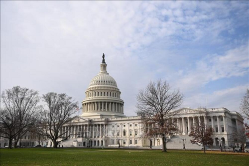 US Congress agrees on stopgap bill to fund federal government into March - ảnh 1