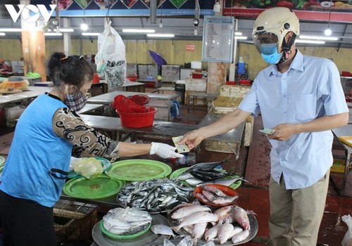 Chợ Nại Hiên Đông, Đà Nẵng mở cửa trở lại sau khi bị phong toả - ảnh 3