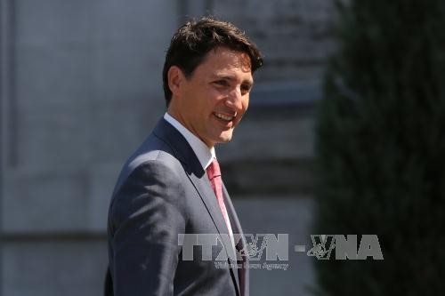 Le Premier ministre canadien entame sa visite au Vietnam - ảnh 1