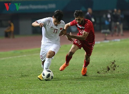 ASIAD 18: le Onze vietnamien qualifié pour la première fois en demi-finale - ảnh 1