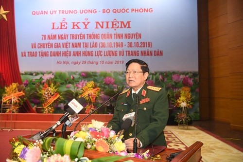 Cérémonie marquant la Journée des soldats volontaires et experts vietnamiens au Laos - ảnh 1