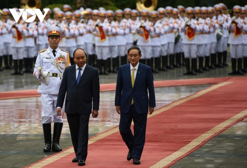 Toàn cảnh lễ đón chính thức Thủ tướng Nhật Bản Suga Yoshihide tại Phủ Chủ tịch - ảnh 9