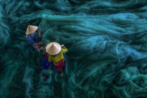 Ảnh người phụ nữ phơi cá của Việt Nam là bức ảnh du lịch đẹp nhất - ảnh 4