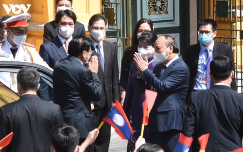 Hình ảnh lễ đón và hội đàm giữa lãnh đạo Việt Nam và Tổng Bí thư, Chủ tịch nước Lào - ảnh 1