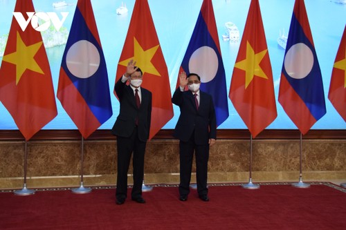 Hình ảnh lễ đón và hội đàm giữa lãnh đạo Việt Nam và Tổng Bí thư, Chủ tịch nước Lào - ảnh 13