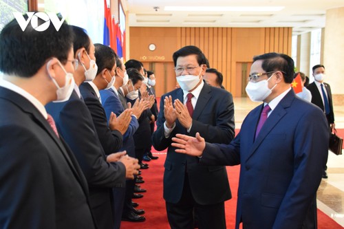 Hình ảnh lễ đón và hội đàm giữa lãnh đạo Việt Nam và Tổng Bí thư, Chủ tịch nước Lào - ảnh 11
