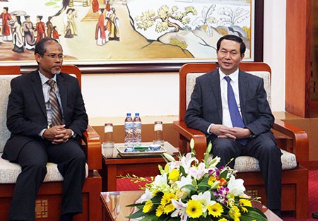 越南公安部部长陈大光会见新加坡和老挝客人 - ảnh 1