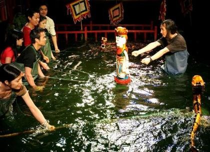 越族独特的民间艺术形式——水上木偶戏 - ảnh 3
