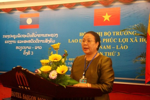 越南劳动荣军社会部与老挝劳动和社会福利部签署第三次部长会议纪要 - ảnh 2