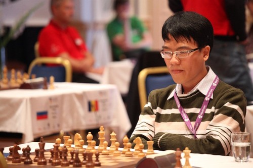 黎光廉击败俄罗斯选手，顺利进入国际象棋大赛第四轮比赛 - ảnh 1