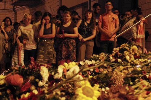 马航MH17空难遇难者中有三名越南人   越南外交部积极帮助越南遇难者家属 - ảnh 1